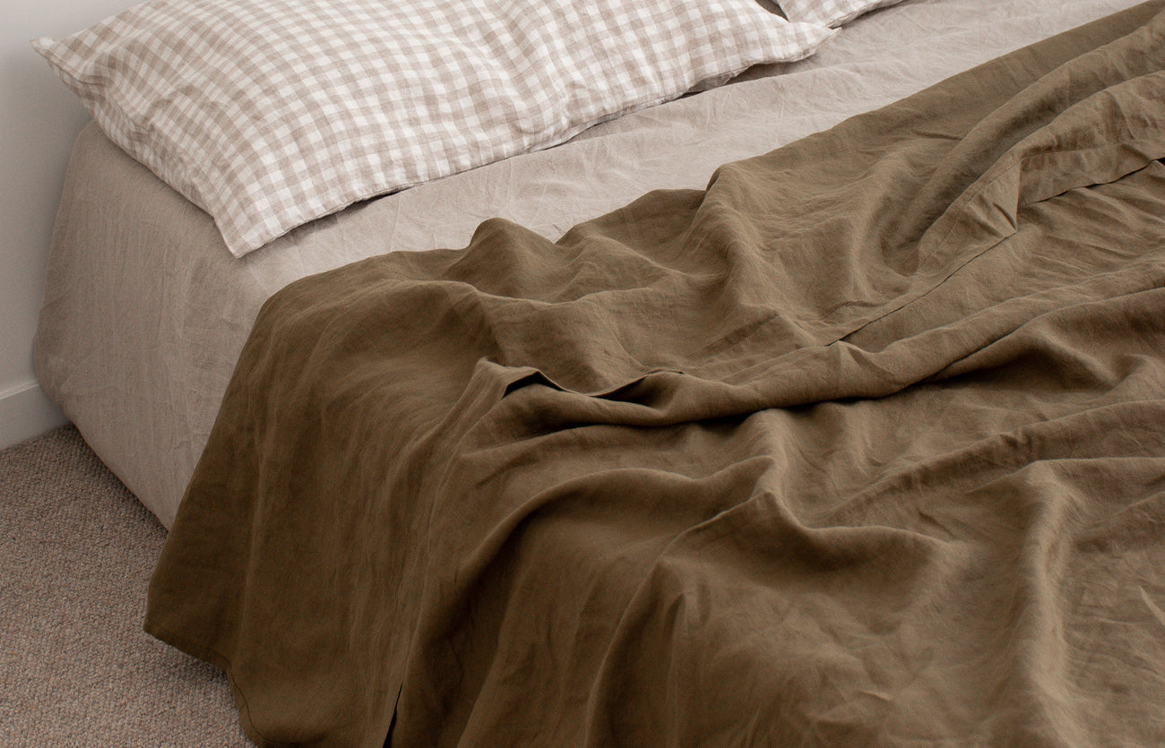 Olive Pillowcases, Pinstripe Flat Sheet and Sage Quilt Cover