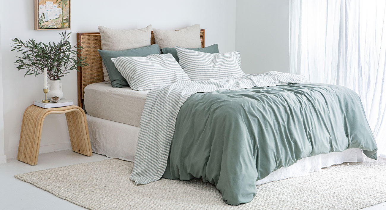 Sea Green Bamboo Quilt Cover styled with Natural, White and Sage Stripe French Linen Sheets