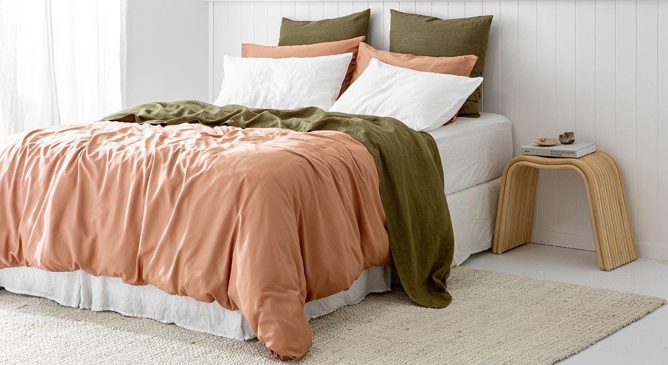 Bamboo Terracotta Quilt Cover styled with Olive and White French Linen Sheets