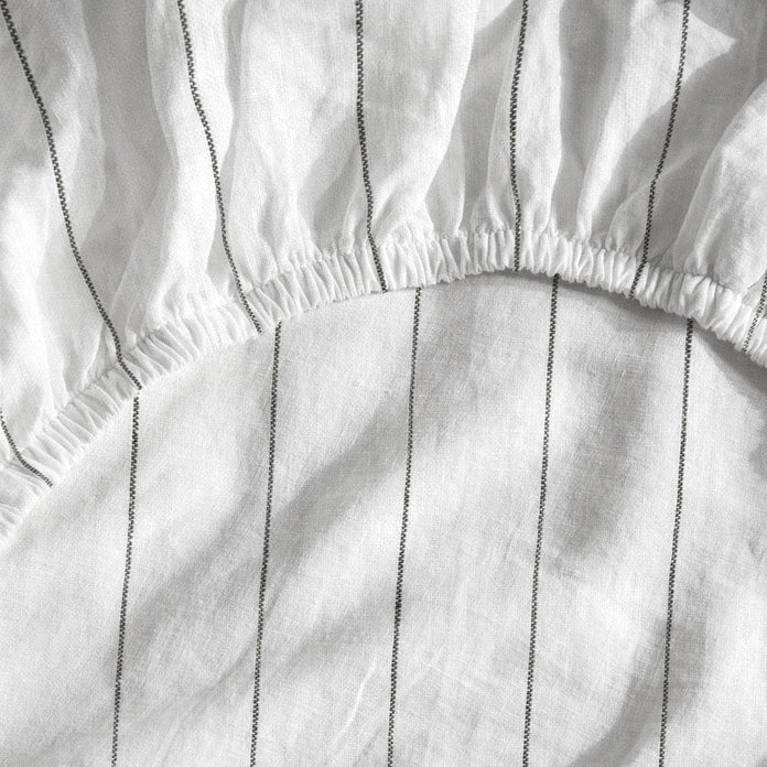Thick elastic hugs your mattress