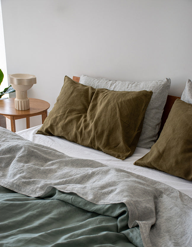 Olive Pillowcases, Pinstripe Flat Sheet and Sage Quilt Cover